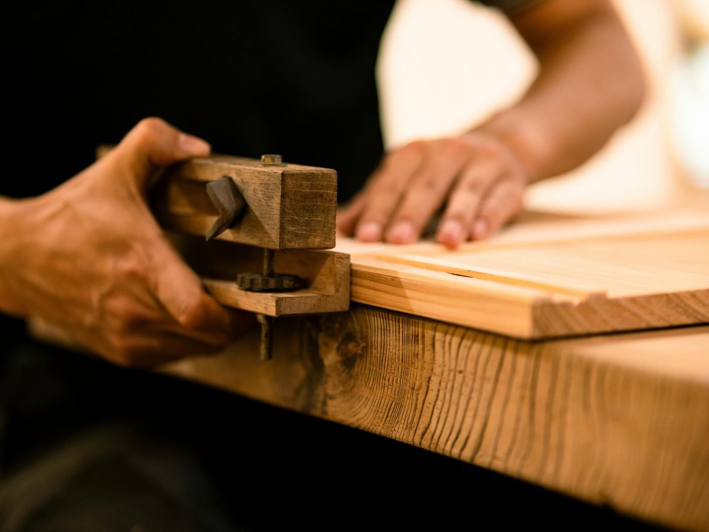 Joiner planing a timber worktop